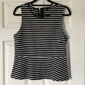 Black and white striped, sleeveless, peplum top